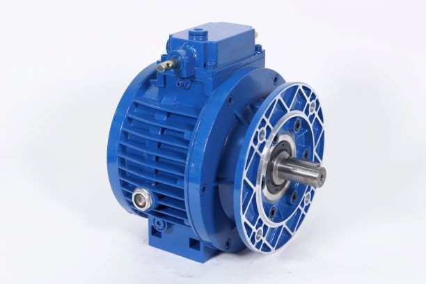 How does the helical gear reducer work